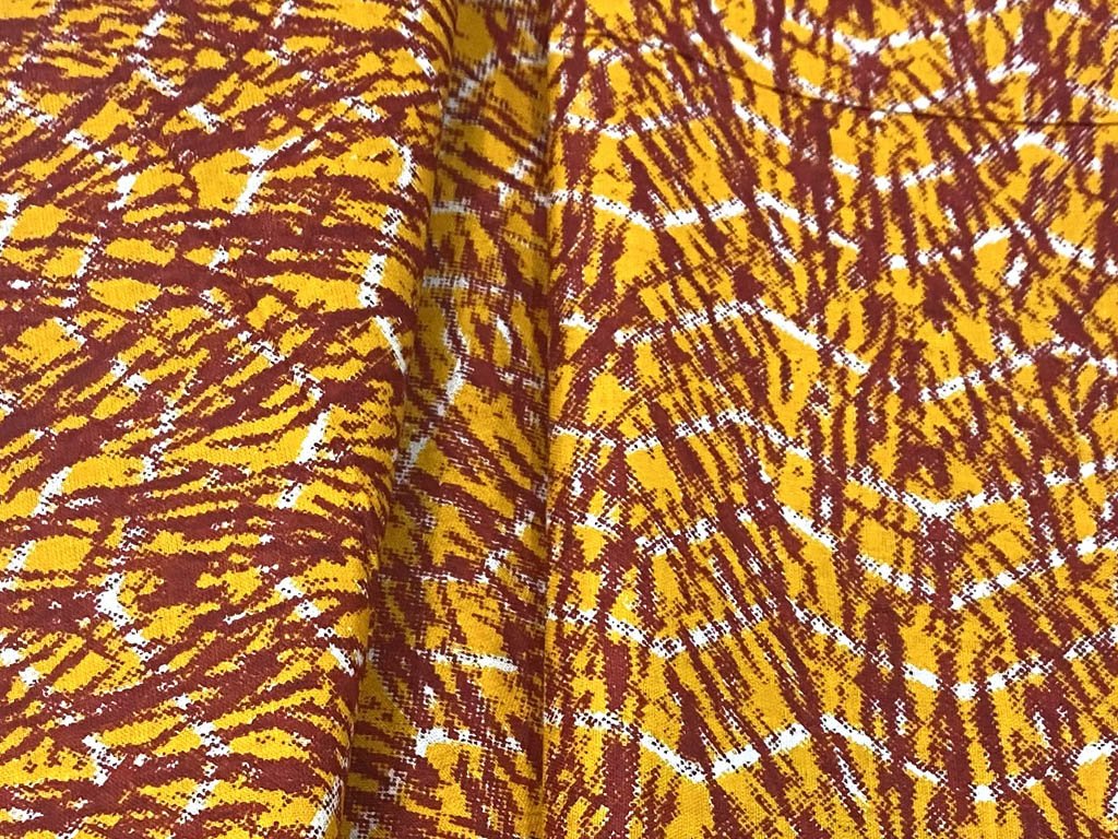 Marigold Yellow and Marron Abstract Printed Pure Cotton Fabric